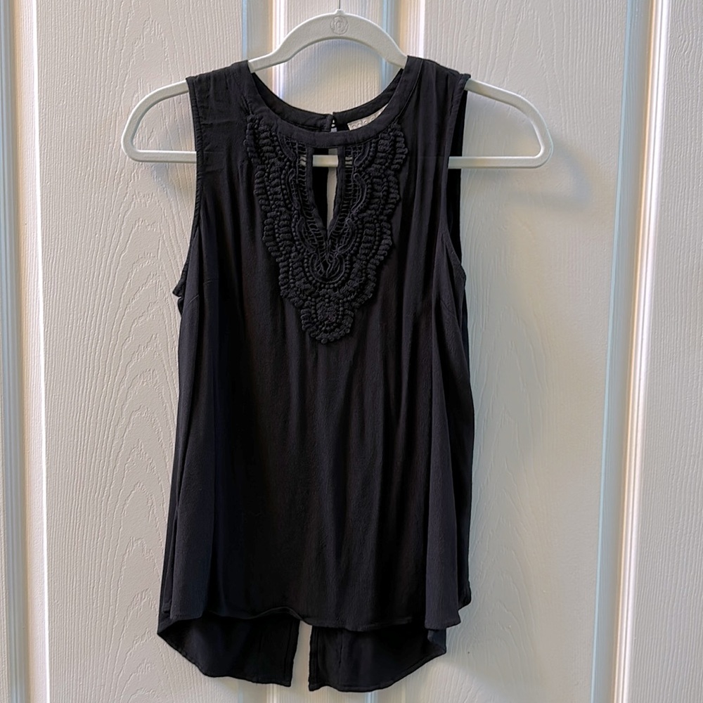 Black drapey tank with crochet detail around neck and down back. Sleeveless, S